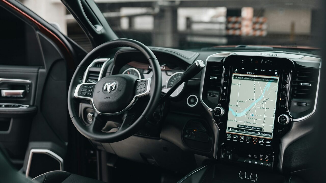 An in-vehicle navigation touchscreen — most detailing customers find and book services from a screen, usually a phone